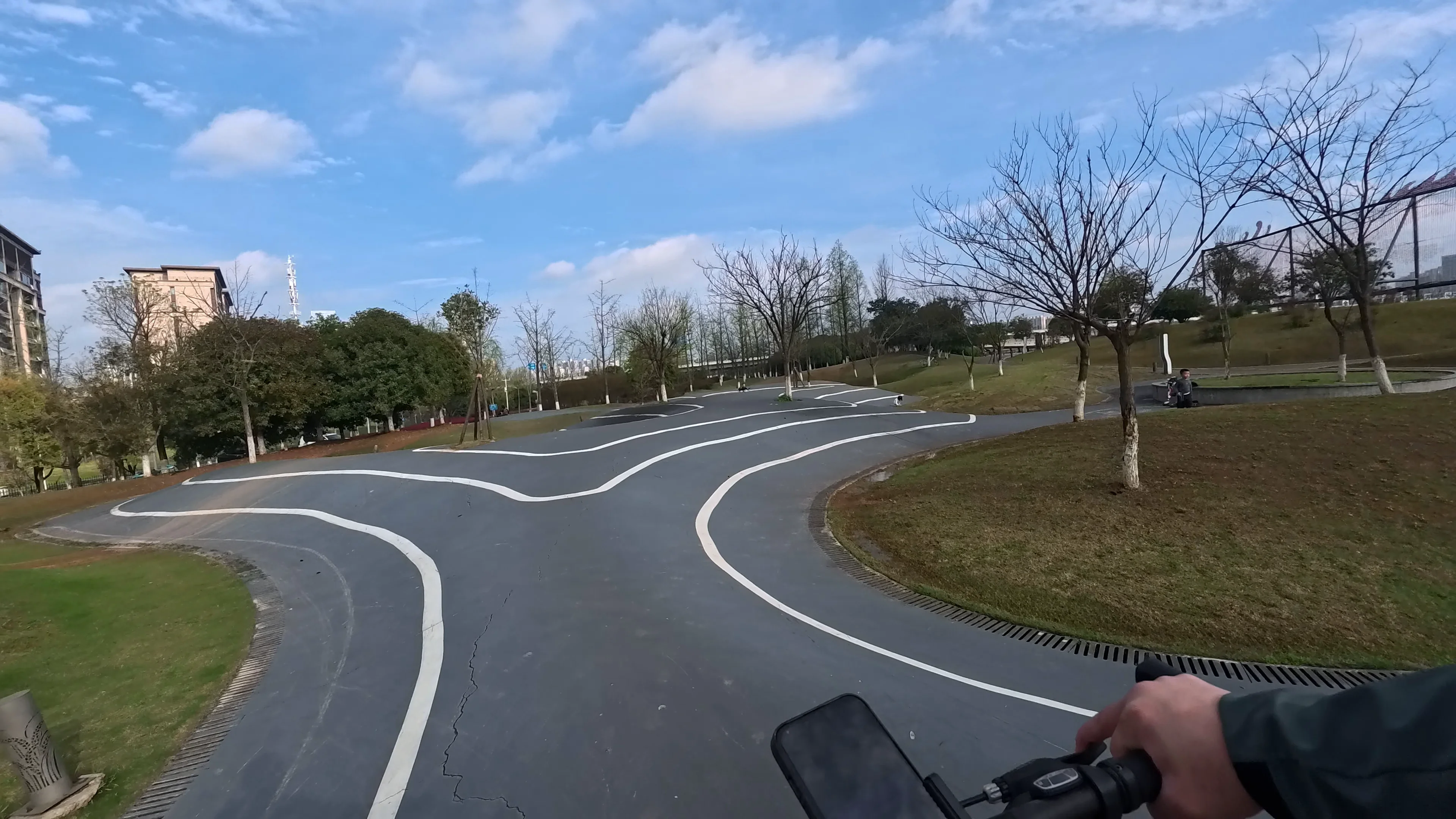 Flowing bike path through a peaceful green landscape
